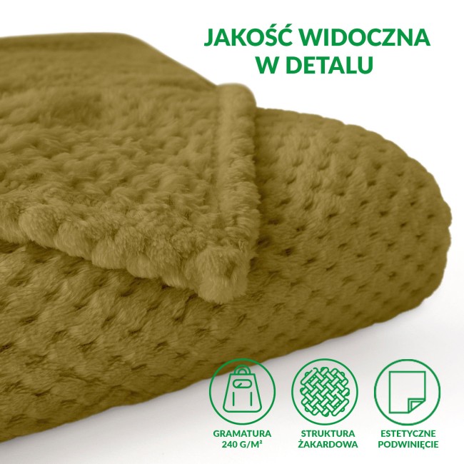 Koc żakardowy o wymiarach 200x220 cm, w kolorze oliwkowym, z teksturą przypominającą pęcherzyki. Złożony w widoku z góry, pokazuje miękką fakturę i rąbek. Idealny do użytku domowego, na łóżko lub kanapę.