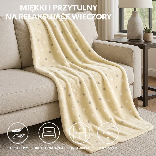 Puszysty koc dekoracyjny 150x200 cm w kolorze żółtym z limonkowymi kropkami, wykonany z miękkiego materiału. Rozłożony na beżowej kanapie, idealny do użytku w domu. Koc jest lekki, ciepły i przeznaczony na sofę lub łóżko.