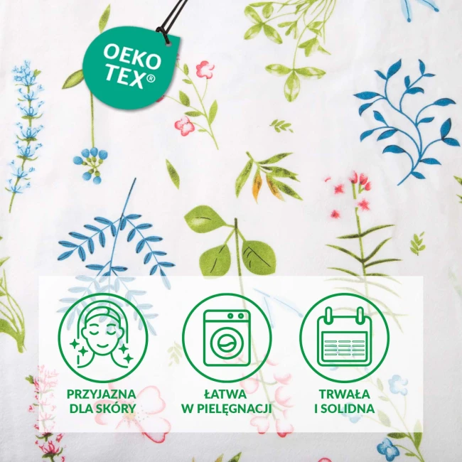 Pościel flanelowa 180x200 Lanira w kolorze białym, ozdobiona różnorodnym wzorem kolorowych kwiatów oraz liści. Ułożona płasko, z bliska, ukazuje detale roślinnych motywów w odcieniach zieleni, niebieskiego i różowego.