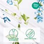 Pościel flanelowa 140x200 Lanira w białym kolorze z kolorowym, kwiatowym wzorem. Zamek błyskawiczny z białą listwą. Ułożona na płasko, przedstawiająca detale materiału oraz wzory roślinne w odcieniach zieleni i niebieskiego.