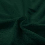Pościel frotte w kolorze butelkowej zieleni o wymiarach 135x200 cm. Materiał o miękkiej, teksturowanej powierzchni, układany w falisty kształt. Produkt idealny do stylizacji sypialni, zapewnia komfort i ciepło.