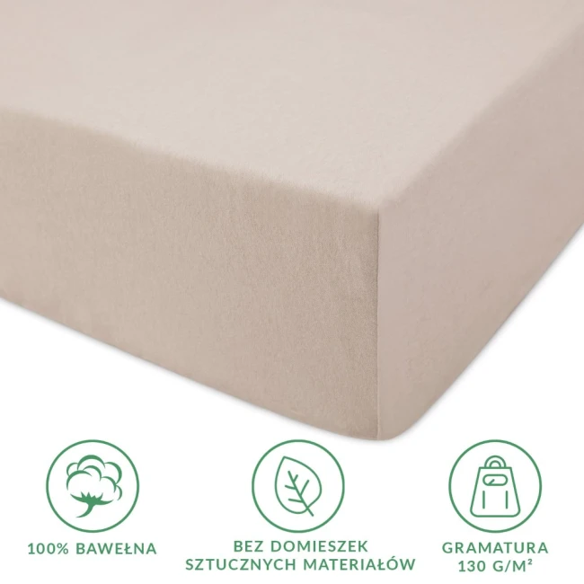 Prześcieradło jersey z gumką w kolorze beżowym, rozmiar 80x160. Produkt leżący, z widoczną miękką fakturą bawełny, bez domieszek sztucznych materiałów. Widoczna gramatura 130 g/m² i ikony sugerujące materiały. Tło jasne, proste.