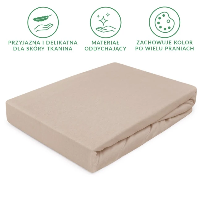 Prześcieradło jersey z gumką w kolorze beżowym, o wymiarach 80x160 cm, leżące na białym tle. Materiał elastyczny i oddychający, zawija się wokół materaca, wykończone bez widocznych dekoracji. Widoczne napisy wskazują na jego właściwości użytkowe.