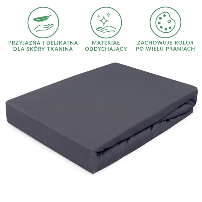 Prześcieradło jersey z gumką 80x160 w kolorze antracytowym, leżące na białym tle. Materiał jest gładki, elastyczny i oddychający. Widoczna gumka wokół krawędzi prześcieradła, zapewniająca dobre dopasowanie do materaca.