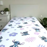 Prześcieradło bawełniane dziecięce z gumką 90x200 Lilo & Stitch, białe