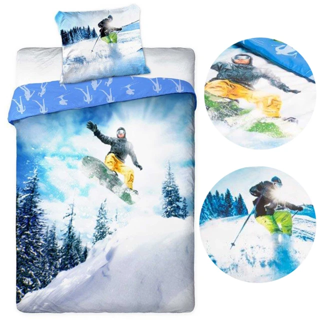  Pościel młodzieżowa ze snowboardzistą skaczącym w śniegu, ośnieżonymi drzewami i niebieskim zimowym tłem 